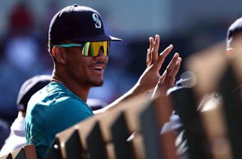 ANAHEIM, CALIFORNIA – SEPTEMBER 19: Julio Rodriguez #44 of the Seattle Mariners reacts to a teammate during the ninth inning against the Los Angeles Angels at Angel Stadium of Anaheim on September 19, 2022 in Anaheim, California. (Photo by Katelyn Mulcahy/Getty Images)