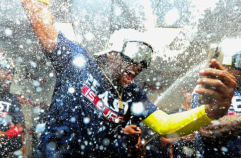 MIAMI, FLORIDA – OCTOBER 04: Ronald Acuna Jr. #13 of the Atlanta Braves celebrates after clinching the division against the Miami Marlins at loanDepot park on October 04, 2022 in Miami, Florida. (Photo by Megan Briggs/Getty Images)