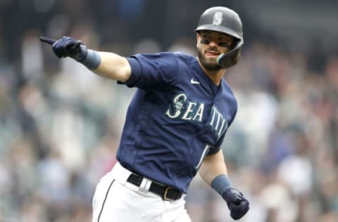 SEATTLE, WASHINGTON – OCTOBER 05: Mitch Haniger #17 of the Seattle Mariners celebrates his home run against the Detroit Tigers during the first inning at T-Mobile Park on October 05, 2022 in Seattle, Washington. (Photo by Steph Chambers/Getty Images)