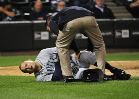 CHICAGO, IL – AUGUST 27: Jesus Montero #63 of the Seattle Mariners reacts after fouling a ball off himself during the fifth inning against the Chicago White Sox on August 27, 2015 at U.S. Cellular Field in Chicago, Illinois. (Photo by David Banks/Getty Images)