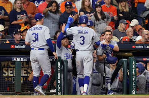 HOUSTON, TX – OCTOBER 29: Chris Taylor #3 of the Los Angeles Dodgers celebrates scoring on a RBI single during the first inning against the Houston Astros in game five of the 2017 World Series at Minute Maid Park on October 29, 2017 in Houston, Texas. (Photo by Christian Petersen/Getty Images)