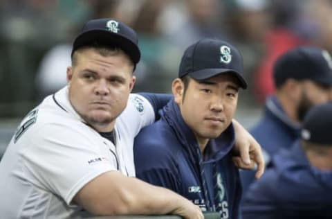 SEATTLE, WA – SEPTEMBER 28: Yusei Kikuchi #18 (R) of the Seattle Mariners stands next to Daniel Vogelbach #20 at the top of the dugout before a game against the Oakland Athletics at T-Mobile Park on September 28, 2019, in Seattle, Washington. (Photo by Stephen Brashear/Getty Images)