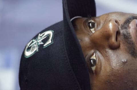 SEATTLE – JUNE 4: Pokey Reese #3 of the Seattle Mariners sits in the dugout during the game with the Tampa Bay Devil Rays on June 4 2005 at Safeco Field in Seattle Washington. The Mariners won 6-5. (Photo by Otto Greule Jr/Getty Images)