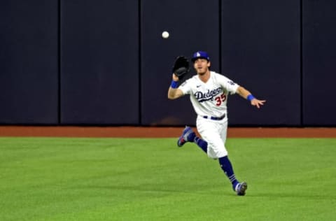 Oct 27, 2020; Arlington, Texas, USA; Los Angeles Dodgers center fielder Cody Bellinger (35) catches a fly ball during the eighth inning against the Tampa Bay Rays during game six of the 2020 World Series at Globe Life Field. Mandatory Credit: Tim Heitman-USA TODAY Sports