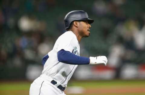 May 4, 2021; Seattle, Washington, USA; Seattle Mariners right fielder Kyle Lewis (1) runs the bases after hitting a three-run home run against the Baltimore Orioles during the eighth inning at T-Mobile Park. Mandatory Credit: Joe Nicholson-USA TODAY Sports