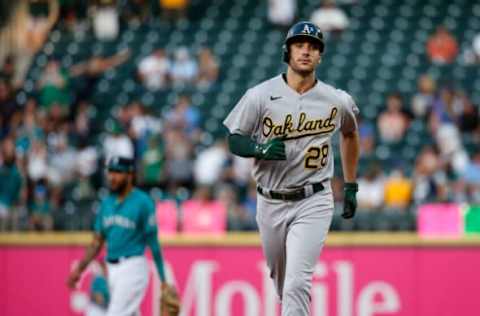 Jul 23, 2021; Seattle, Washington, USA; Oakland Athletics first baseman Matt Olson (28) rounds the bases after hitting a solo home run against the Seattle Mariners during the fourth inning at T-Mobile Park. Mandatory Credit: Jennifer Buchanan-USA TODAY Sports