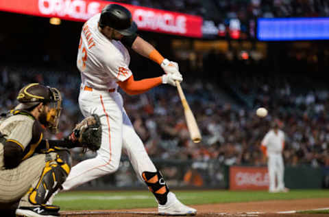 Sep 14, 2021; San Francisco, California, USA; San Francisco Giants third baseman Kris Bryant (23) hits a double against the San Diego Padres in the second inning at Oracle Park. Mandatory Credit: John Hefti-USA TODAY Sports