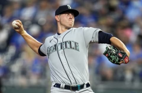 Sep 17, 2021; Kansas City, Missouri, USA; Seattle Mariners starting pitcher Chris Flexen (77) pitches against the Kansas City Royals during the first inning at Kauffman Stadium. Mandatory Credit: Jay Biggerstaff-USA TODAY Sports