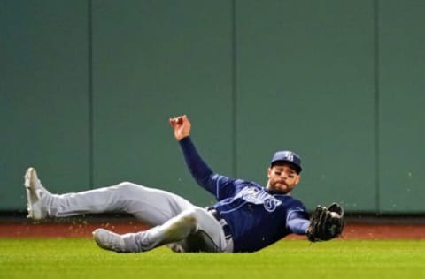 Oct 11, 2021; Boston, Massachusetts, USA; Tampa Bay Rays center fielder Kevin Kiermaier (39) makes a catch for an out against the Boston Red Sox during the second inning during game four of the 2021 ALDS at Fenway Park. Mandatory Credit: David Butler II-USA TODAY Sports