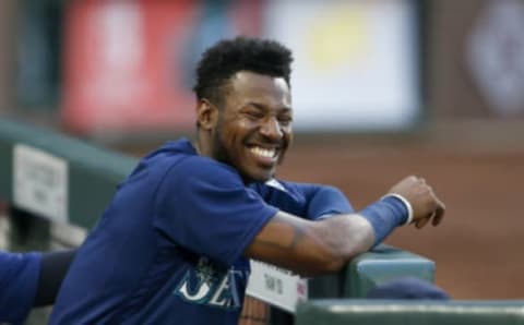 Seattle Mariners center fielder Kyle Lewis stands in the dugout during the second inning against the Houston Astros. Mandatory Credit: Joe Nicholson-USA TODAY Sports