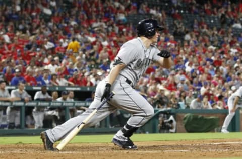 Aug 30, 2016; Arlington, TX, USA; Seattle Mariners third baseman Kyle Seager (15) drives in two runs in the fifth inning against the Texas Rangers at Globe Life Park in Arlington. Mandatory Credit: Tim Heitman-USA TODAY Sports