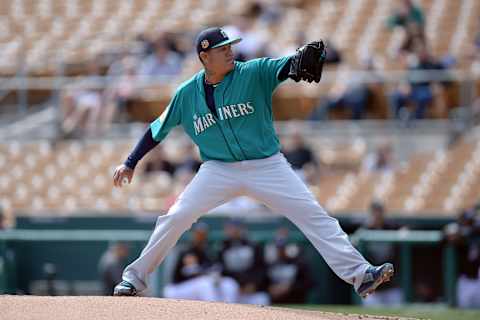 Feb 28, 2017; Phoenix, AZ, USA; Seattle Mariners starting pitcher Felix Hernandez (34) pitches in the first inning against the Chicago White Sox at Camelback Ranch. Mandatory Credit: Joe Camporeale-USA TODAY Sports