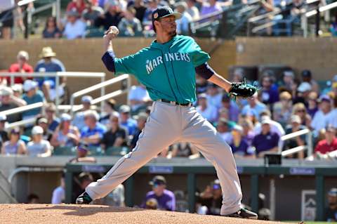 Mar 4, 2017; Salt River Pima-Maricopa, AZ, USA; Seattle Mariners starting pitcher Yovani Gallardo (49) throws during the first inning against the Colorado Rockies during a spring training game at Salt River Fields at Talking Stick. Mandatory Credit: Matt Kartozian-USA TODAY Sports