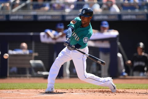 Mar 10, 2017; Peoria, AZ, USA; Seattle Mariners center fielder Jarrod Dyson (1) swings at a pitch against the Chicago Cubs during the first inning at Peoria Stadium. Mandatory Credit: Joe Camporeale-USA TODAY Sports