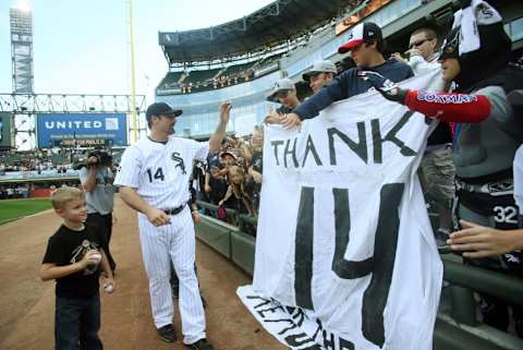 Sep 28, 2014; Chicago, IL, USA; Chicago White Sox first baseman Paul Konerko (14) waves to fans in the stands after the game against the Kansas City Royals at U.S Cellular Field. Mandatory Credit: Jerry Lai-USA TODAY Sports