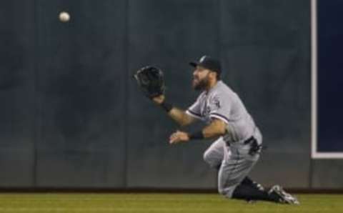 Apr 13, 2016; Minneapolis, MN, USA; Chicago White Sox right fielder Adam Eaton (1) fields a fly hit by Minnesota Twins third baseman Trevor Plouffe (not pictured) in the fourth inning at Target Field. Mandatory Credit: Bruce Kluckhohn-USA TODAY Sports