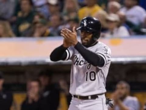 Apr 4, 2016; Oakland, CA, USA; Chicago White Sox center fielder Austin Jackson (10) celebrates after a scoring a run against the Oakland Athletics during the third inning at the Oakland Coliseum. Mandatory Credit: Kelley L Cox-USA TODAY Sports