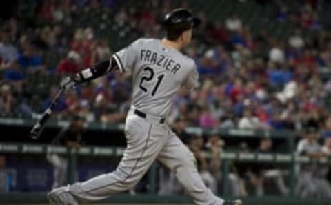 May 9, 2016; Arlington, TX, USA; Chicago White Sox third baseman Todd Frazier (21) hits a grand slam against the Texas Rangers during the twelfth inning at Globe Life Park in Arlington. The White Sox defeat the Rangers 8-4 in 12 innings. Mandatory Credit: Jerome Miron-USA TODAY Sports