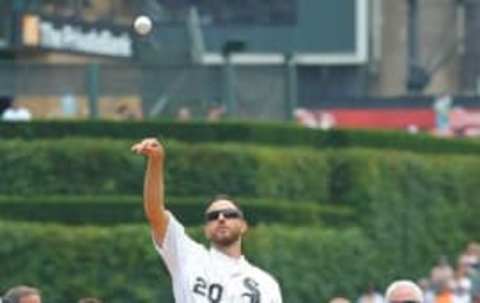 Jul 18, 2015; Chicago, IL, USA; Chicago White Sox former pitcher Jon Garland throws out the ceremonial first pitch during ceremonies to commemorate the 10th anniversary of the 2005 World Series championship prior to a game against the Kansas City Royals at U.S Cellular Field. Kansas City won 7-6 in 13 innings. Mandatory Credit: Dennis Wierzbicki-USA TODAY Sports