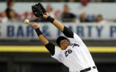 Sep 9, 2014; Chicago, IL, USA; Chicago White Sox right fielder Avisail Garcia (26) misplays a foul ball hit by Oakland Athletics first baseman Nate Freiman (not pictured) for an error during the second inning at U.S Cellular Field. Mandatory Credit: Jerry Lai-USA TODAY Sports