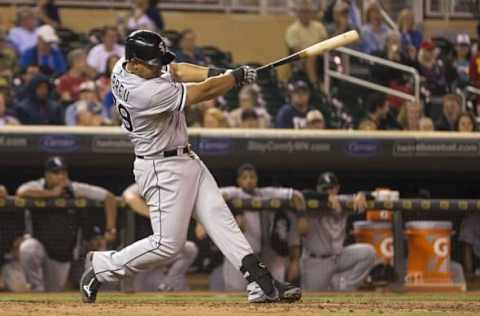 Sep 3, 2014; Minneapolis, MN, USA; Chicago White Sox designated hitter Jose Abreu (79) hits a single in the fifth inning against the Minnesota Twins at Target Field. The Twins won 11-4. Mandatory Credit: Jesse Johnson-USA TODAY Sports