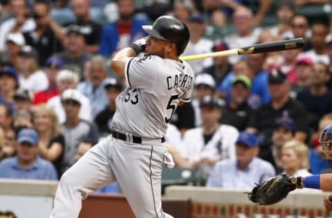 Jul 28, 2016; Chicago, IL, USA; Chicago White Sox left fielder Melky Cabrera (53) hits an RBI double during the first inning against the Chicago Cubs at Wrigley Field. Mandatory Credit: Caylor Arnold-USA TODAY Sports