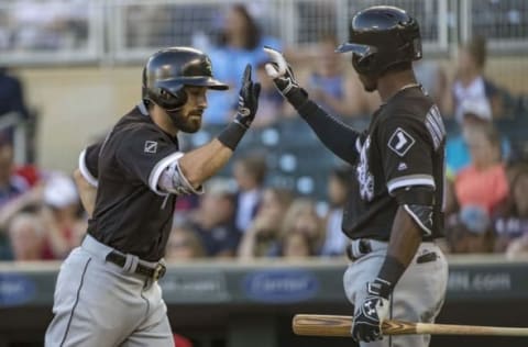 Jul 29, 2016; Minneapolis, MN, USA; Chicago White Sox right fielder Adam Eaton (1) celebrates with shortstop Tim Anderson (12) after hitting a home run in the first inning against the Minnesota Twins at Target Field. Mandatory Credit: Jesse Johnson-USA TODAY Sports