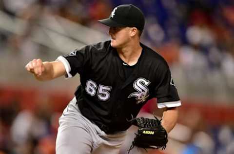 Aug 12, 2016; Miami, FL, USA; Chicago White Sox relief pitcher Nate Jones (65) delivers a pitch during the seventh inning against the Miami Marlins at Marlins Park. Mandatory Credit: Steve Mitchell-USA TODAY Sports