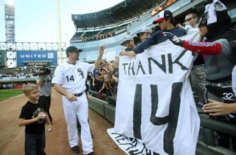 Sep 28, 2014; Chicago, IL, USA; Chicago White Sox first baseman Paul Konerko (14) waves to fans in the stands after the game against the Kansas City Royals at U.S Cellular Field. Mandatory Credit: Jerry Lai-USA TODAY Sports