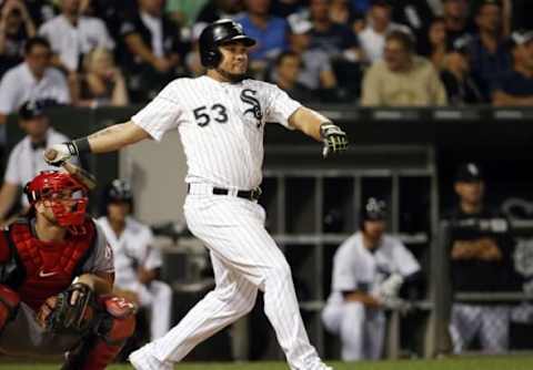 Aug 10, 2015; Chicago, IL, USA; Chicago White Sox left fielder Melky Cabrera (53) hits a double against the Los Angeles Angels in the sixth inning at U.S Cellular Field. Mandatory Credit: Kamil Krzaczynski-USA TODAY Sports