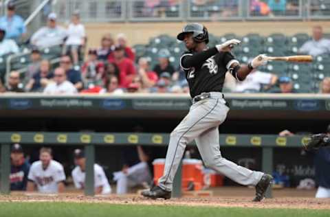 Sep 4, 2016; Minneapolis, MN, USA; Chicago White Sox shortstop Tim Anderson (12) hits a two run double during the twelfth inning against the Minnesota Twins at Target Field. The Chicago White Sox defeated the Minnesota Twins 13-11. Mandatory Credit: Jordan Johnson-USA TODAY Sports