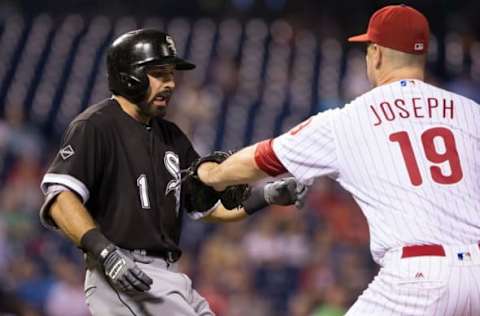 Sep 20, 2016; Philadelphia, PA, USA; Philadelphia Phillies first baseman Tommy Joseph (19) tags out Chicago White Sox right fielder Adam Eaton (1) during the fifth inning at Citizens Bank Park. Mandatory Credit: Bill Streicher-USA TODAY Sports