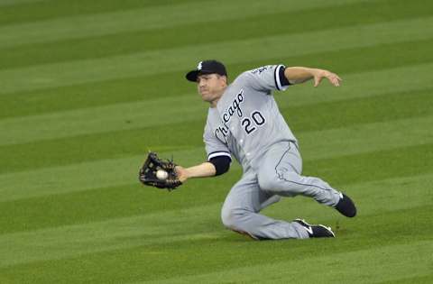 Aug 17, 2016; Cleveland, OH, USA; Chicago White Sox center fielder J.B. Shuck (20) makes a sliding catch in the sixth inning against the Cleveland Indians at Progressive Field. Mandatory Credit: David Richard-USA TODAY Sports