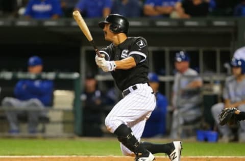 Sep 10, 2016; Chicago, IL, USA; Chicago White Sox second baseman Tyler Saladino (18) hits a single during the ninth inning against the Kansas City Royals at U.S. Cellular Field. Kansas City won 6-5. Mandatory Credit: Dennis Wierzbicki-USA TODAY Sports