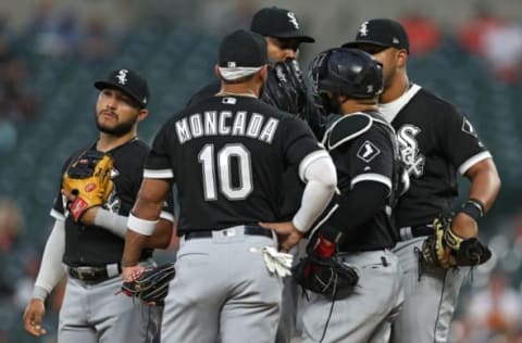 BALTIMORE, MARYLAND – APRIL 23: Starting pitcher Ivan Nova #46 of the Chicago White Sox talks with teammates during the second inning against the Baltimore Orioles at Oriole Park at Camden Yards on April 23, 2019 in Baltimore, Maryland. (Photo by Patrick Smith/Getty Images)