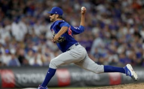 DENVER, COLORADO – JUNE 10: Pitcher Steve Cishek #41 of the Chicago Cubs throws in the eighth inning against the Colorado Rockies at Coors Field on June 10, 2019 in Denver, Colorado. (Photo by Matthew Stockman/Getty Images)