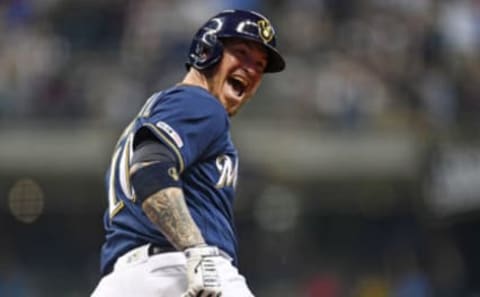 MILWAUKEE, WISCONSIN – AUGUST 13: Yasmani Grandal #10 of the Milwaukee Brewers celebrates following a three run home run against the Minnesota Twins during the seventh inning at Miller Park on August 13, 2019 in Milwaukee, Wisconsin. (Photo by Stacy Revere/Getty Images)