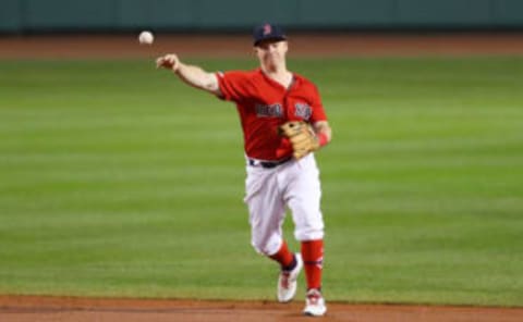 BOSTON, MASSACHUSETTS – SEPTEMBER 09: Brock Holt #12 of the Boston Red Sox throws to first base during the second inning of the game between the Boston Red Sox and the New York Yankees at Fenway Park on September 09, 2019, in Boston, Massachusetts. (Photo by Maddie Meyer/Getty Images)