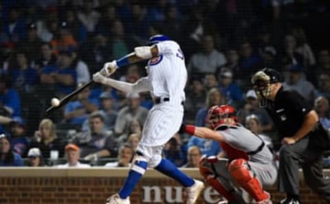 CHICAGO, ILLINOIS – SEPTEMBER 16: Nicholas Castellanos #6 of the Chicago Cubs hits a two run double in the eight inning against the Cincinnati Reds at Wrigley Field on September 16, 2019 in Chicago, Illinois. (Photo by Quinn Harris/Getty Images)