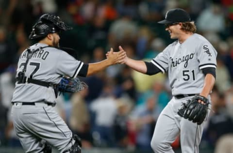 SEATTLE, WA – JULY 19: Relief pitcher Carson Fulmer #51 of the Chicago White Sox is congratulated by catcher Dioner Navarro #27 after defeating the Seattle Mariners 6-1 at Safeco Field on July 19, 2016 in Seattle, Washington. (Photo by Otto Greule Jr/Getty Images)