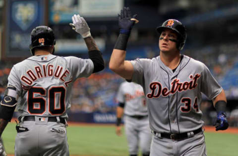 ST PETERSBURG, FL – JULY 11: James McCann #34 of the Detroit Tigers is congratulated after hitting a two run home run in the fourth inning during a game against the Tampa Bay Rays at Tropicana Field on July 11, 2018 in St Petersburg, Florida. (Photo by Mike Ehrmann/Getty Images)