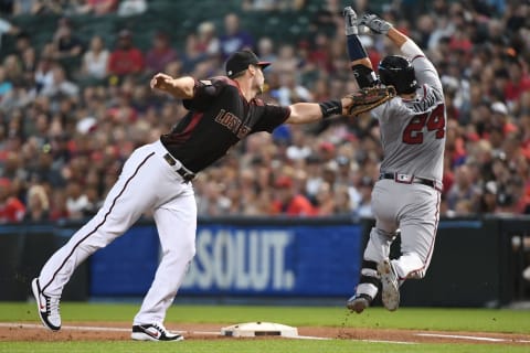 PHOENIX, AZ – SEPTEMBER 08: Paul Goldschmidt #44 of the Arizona Diamondbacks makes the tag on Kurt Suzuki #24 of the Atlanta Braves in the first inning of the MLB game at Chase Field on September 8, 2018 in Phoenix, Arizona. (Photo by Jennifer Stewart/Getty Images)