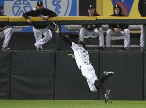 CHICAGO, IL – SEPTEMBER 25: Nicky Delmonico #30 of the Chicago White Sox makes a diving catch on Francisco Lindor #12 of the Cleveland Indians during the fourth inning on September 25, 2018 at Guaranteed Rate Field in Chicago, Illinois. (Photo by David Banks/Getty Images)