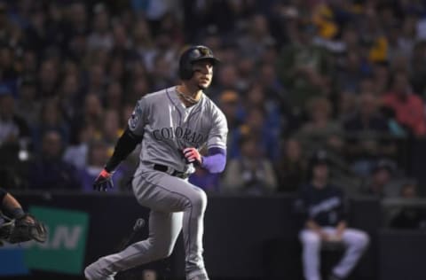 MILWAUKEE, WI – OCTOBER 04: Carlos Gonzalez #5 of the Colorado Rockies reacts after hitting a triple during the fifth inning Game One of the National League Division Series against the Milwaukee Brewers at Miller Park on October 4, 2018 in Milwaukee, Wisconsin. (Photo by Stacy Revere/Getty Images)