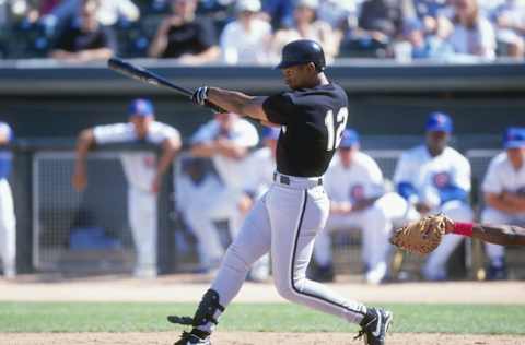 9 Mar 1999: Outfielder Singleton #12 of the Chicago White Sox hits the ball during the Spring Training game against the Chicago Cubs at the HoHoKam Park in Mesa, Arizona. The Cubs defeated the White Sox 13-2. Mandatory Credit: Stephen Dunn /Allsport