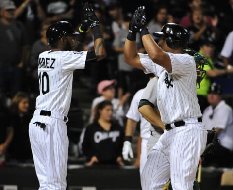 Alexei Ramirez, L, and Jose Abreu of the Chicago White Sox (Photo by David Banks/Getty Images)