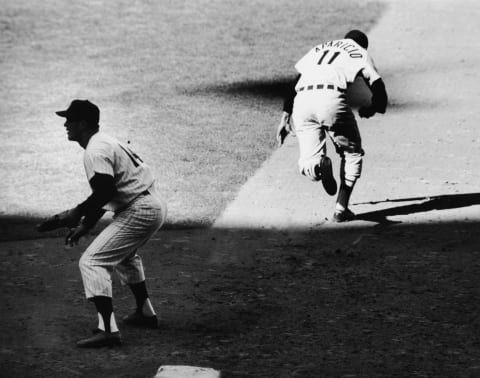 Bill Skowron of the New York Yankees, L, and Luis Aparicio of the Chicago White Sox. (Photo by Robert Riger Collection/Getty Images)