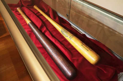 NEW YORK, NY – OCTOBER 13: A bat owned by baseball legend Babe Ruth (right) and one owned by “Shoeless” Joe Jackson are displayed at auction house Christie’s for the upcoming sale ‘The Golden Age of Baseball’ on October 13, 2016 in New York City. Over 400 items are up for sale, including a bat once swung by Micky Mantle and baseballs signed by Babe Ruth and Jackie Robinson. Some pieces are expected to draw up to $700,000 at the auction on October 19 and 20. (Photo by Spencer Platt/Getty Images)