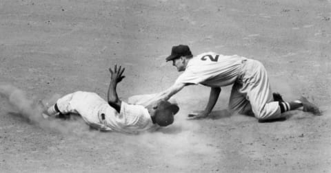 Minnie Minoso of the Cleveland Indians, L, and Nellie Fox of the Chicago White Sox. (Photo by Mark Rucker/Transcendental Graphics, Getty Images)