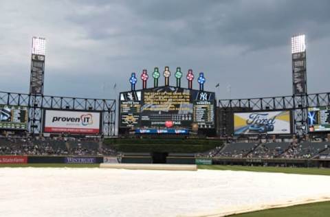 CHICAGO, IL – JUNE 29: A tarp cover the field as the start of the game between the Chicago White Sox and the New York Yankees is delayed because of the weather on June 29, 2017 at Guaranteed Rate Field in Chicago, Illinois. (Photo by David Banks/Getty Images)